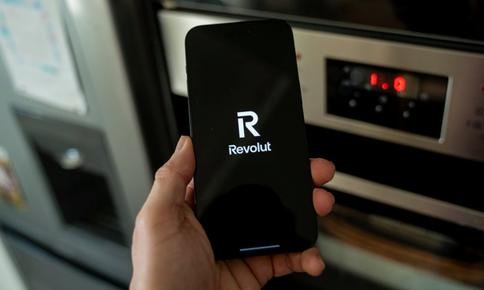 TechDogs- "An Image Showing The Revolut Logo On A Smartphone"